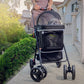 casual black pet stroller with dog